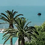 מלון Domes Of Corfu, Autograph Collection 5*